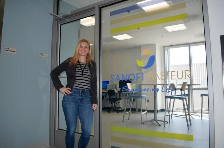 Jennifer Umstead stands outside the BSL3 lab in her street clothes.