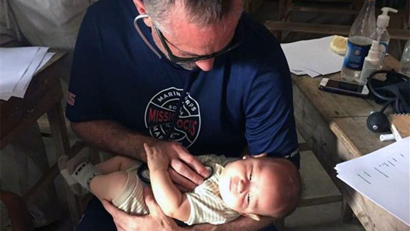 Doctor providing treatment for a baby.