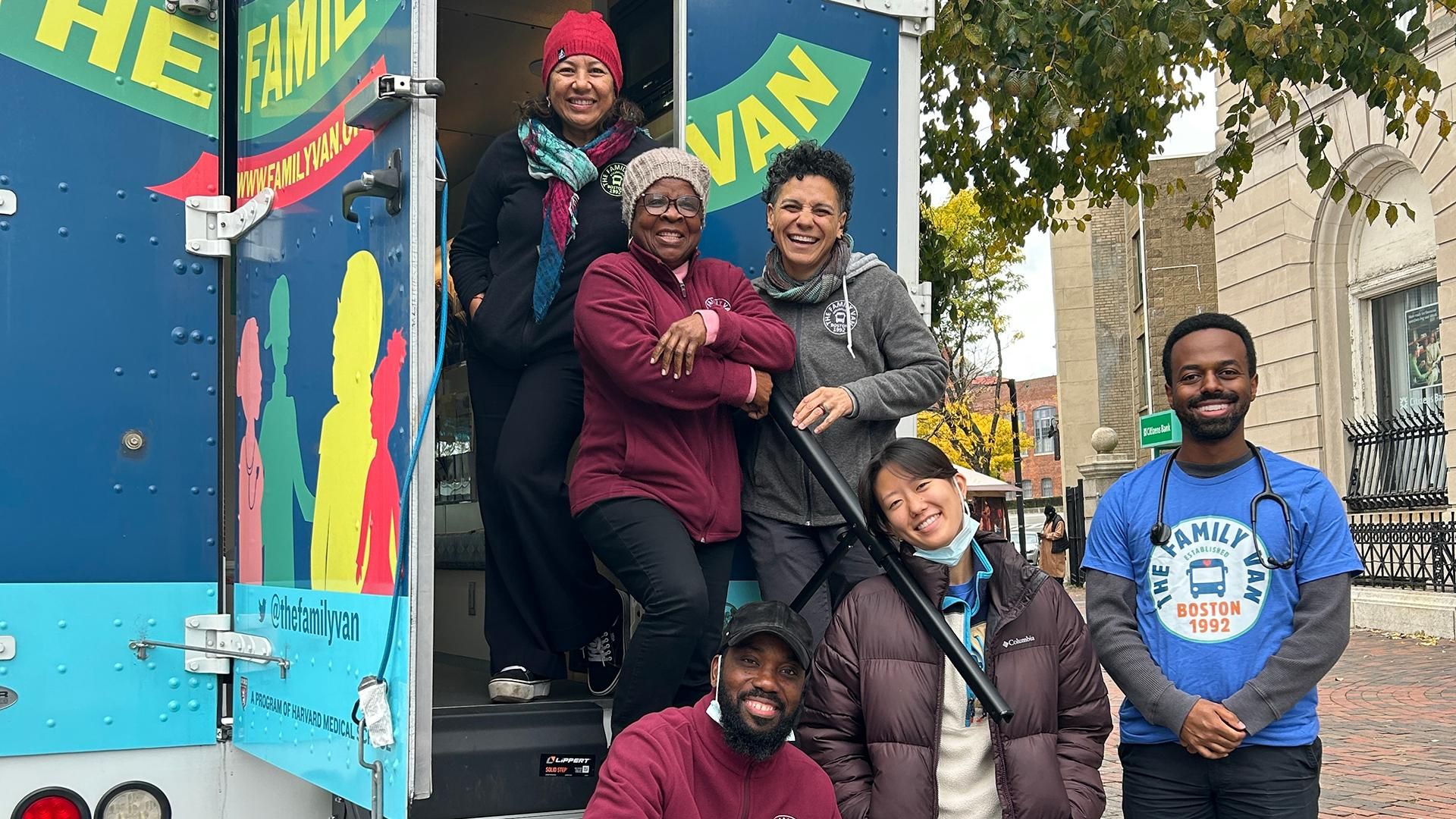 The Family Van mobile health unit, a Harvard Medical School program, parked in a community neighborhood offering free health screenings and outreach services.